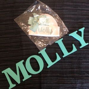 Infant newborn baby hat embroidered “Molly”